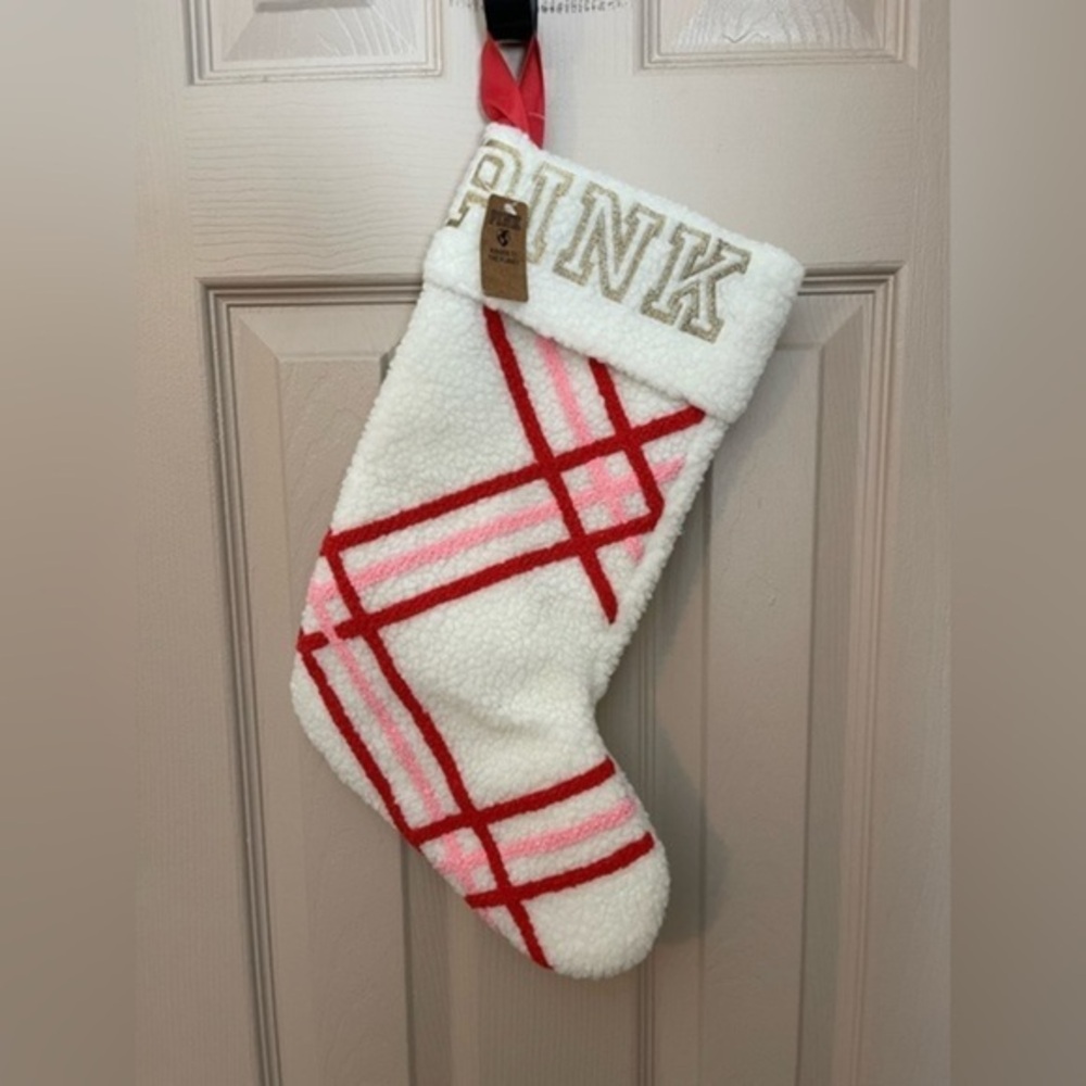 Pink Victoria’s Secret NWT Sherpa Christmas stocking w/red & pink stripes.